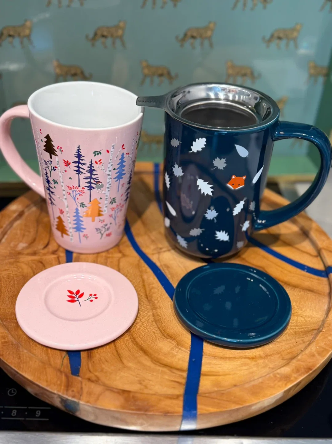 David’s tea mugs with lids and an infuser