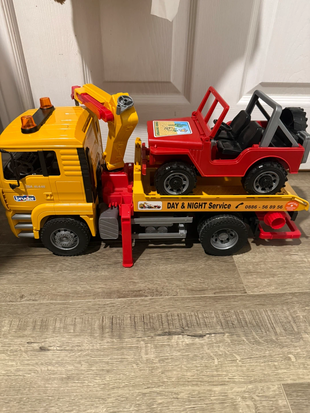 Bruder MAN TGA Tow Truck with Jeep