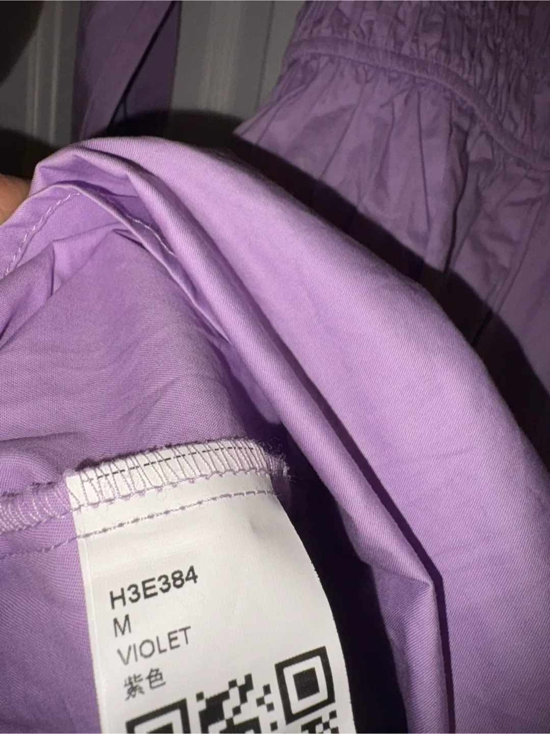 New lavender V-neck dress with smocked detailing on the sleeves image indicator(4)