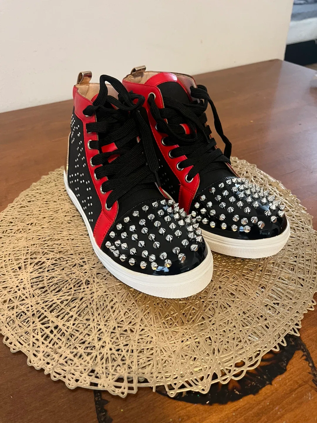 Christian Louboutin Studded High-Top Sneakers image indicator(4)