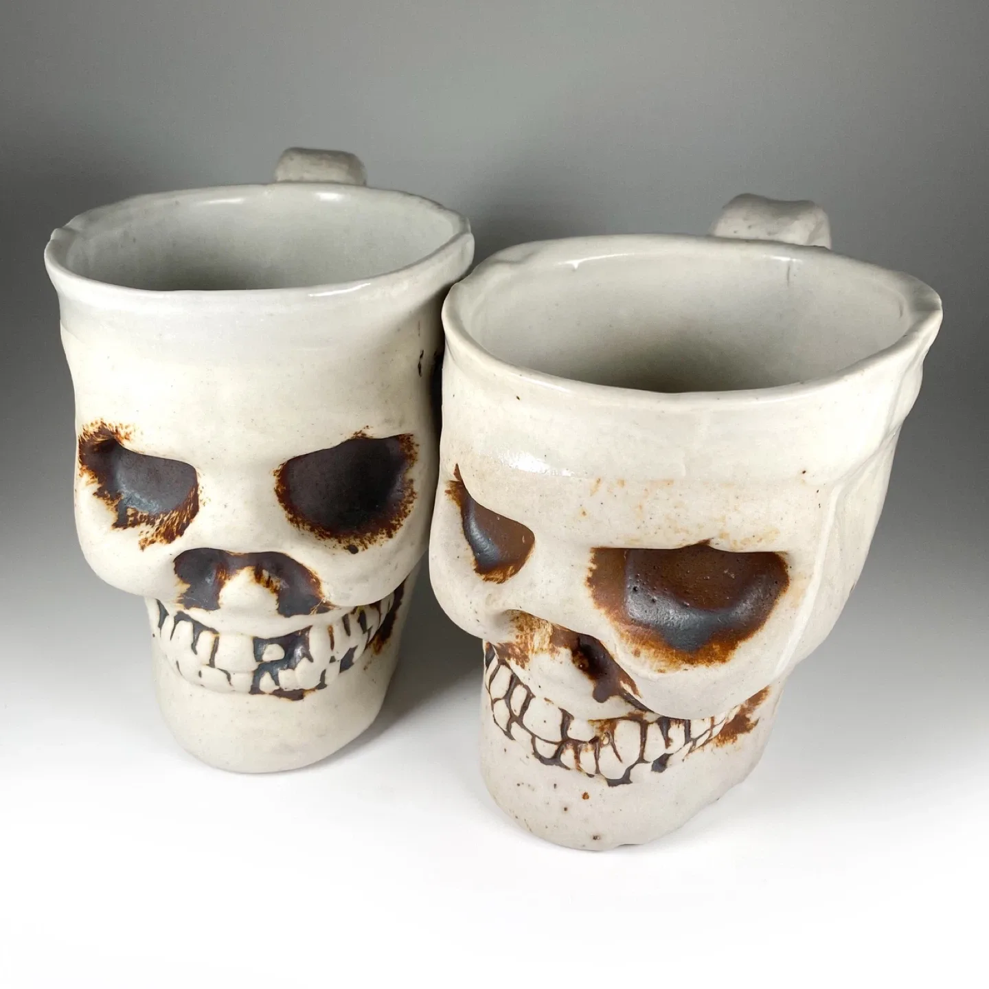 Pair of Ceramic Skull Mugs image indicator(2)