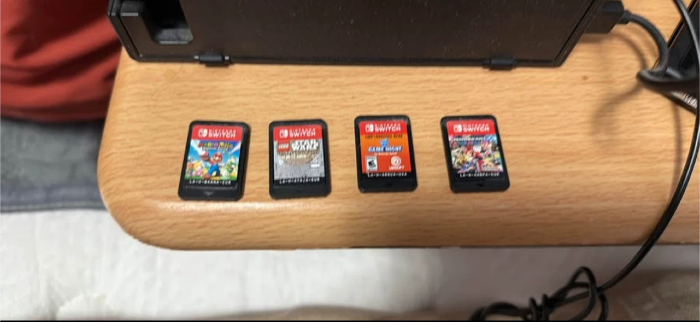 Nintendo Switch Console with Games and Accessories - photo 5
