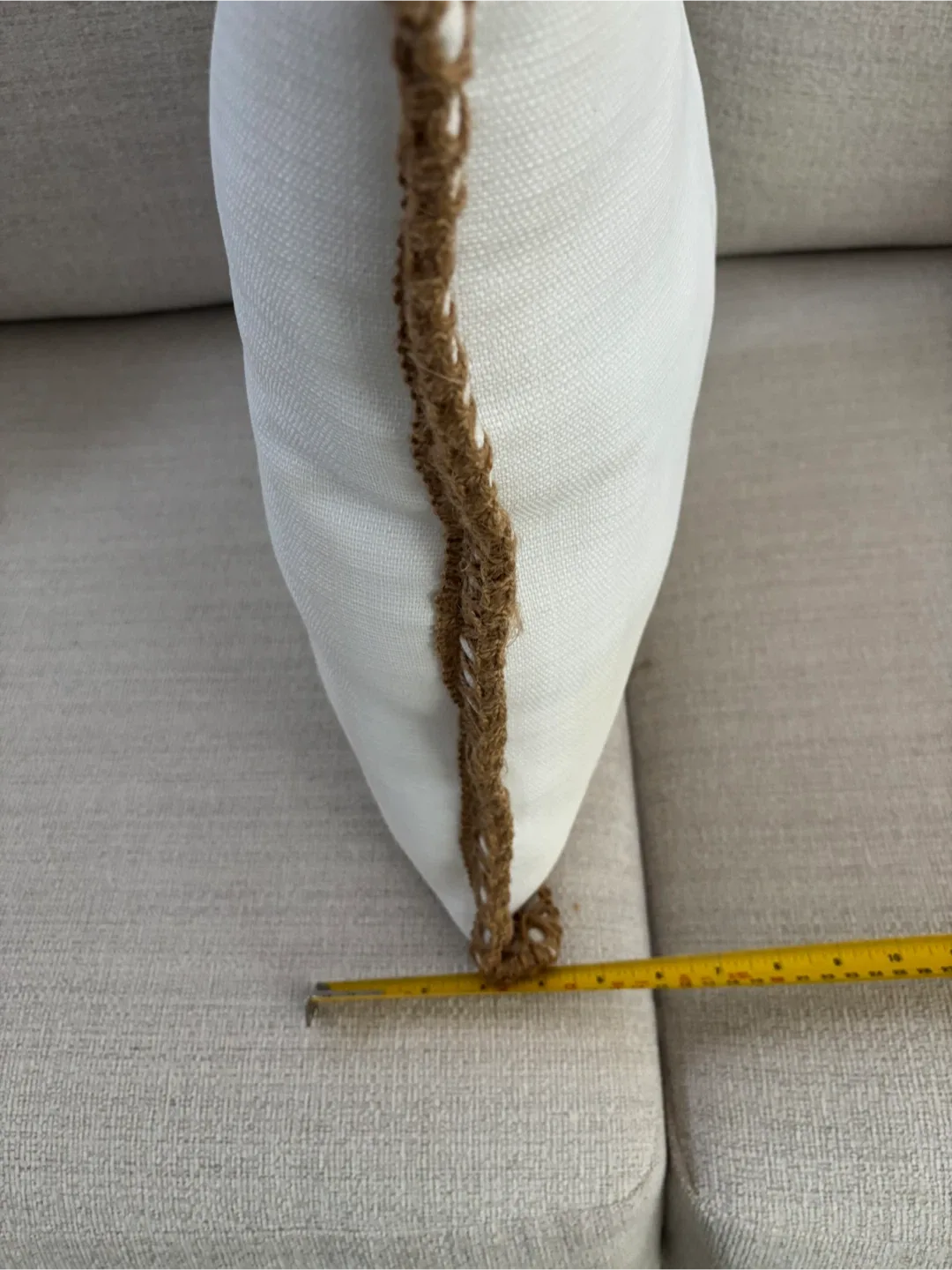 White Throw Pillow with Brown Trim image indicator(3)