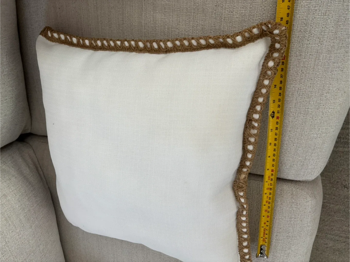 White Throw Pillow with Brown Trim image indicator(2)