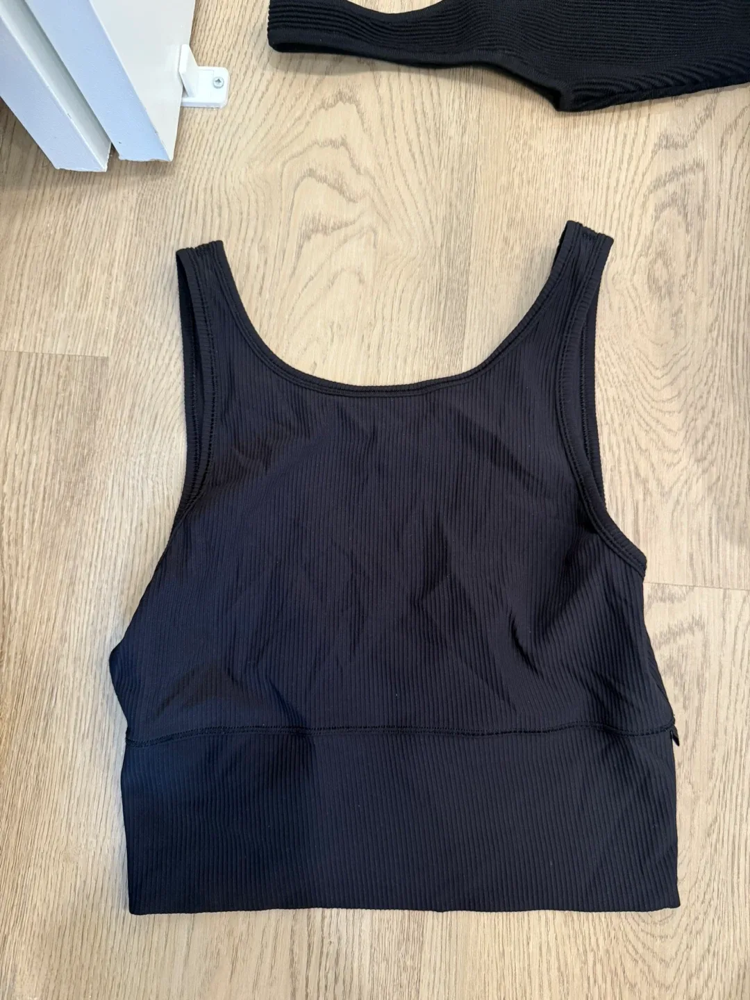 Babaton Knit Top, Patagonia Shorts, Lululemon Jacket image indicator(4)