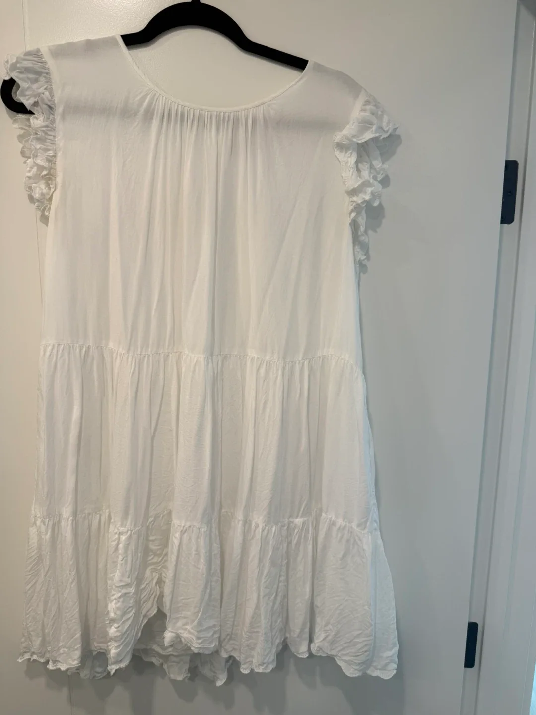 Babaton Knit Top, Patagonia Shorts, Lululemon Jacket image indicator(9)