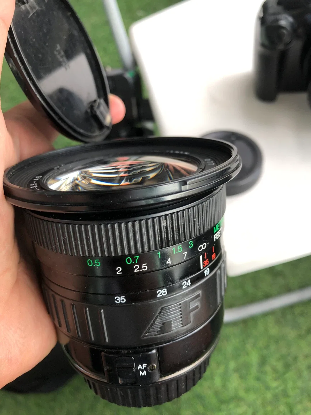 Canon camera with 5 lenses AF 55-200mm f/4-5.6 Di II LD Lens image indicator(6)