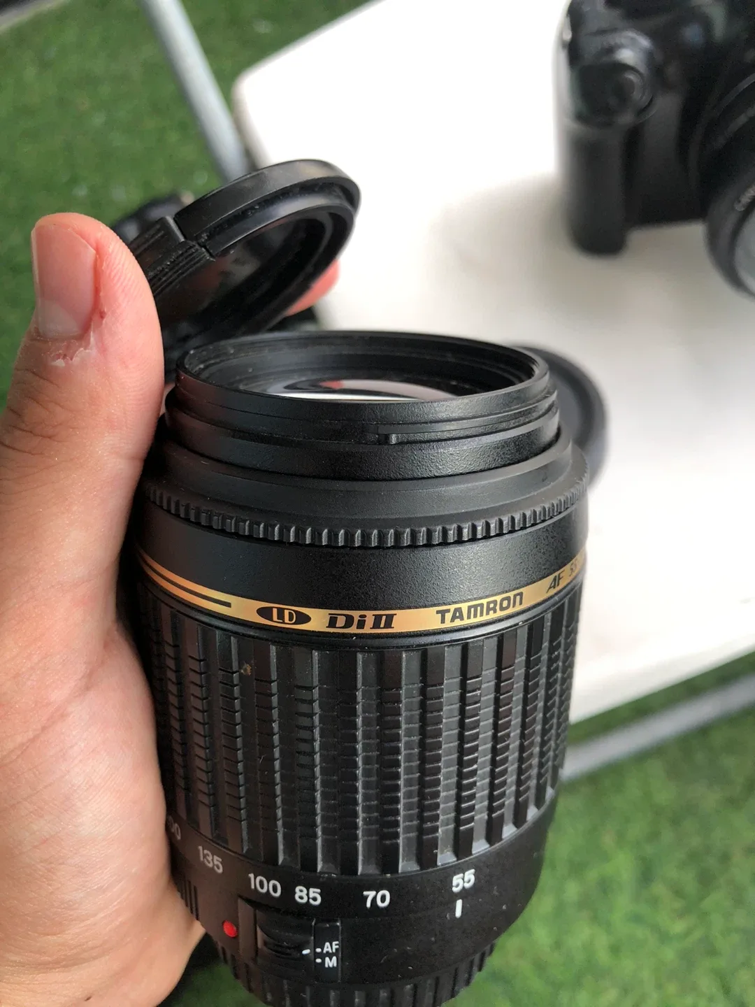 Canon camera with 5 lenses AF 55-200mm f/4-5.6 Di II LD Lens image indicator(3)