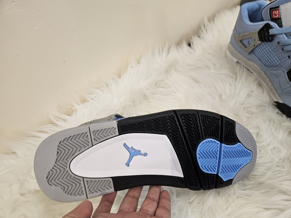 Jordan 4s UNC - photo 4