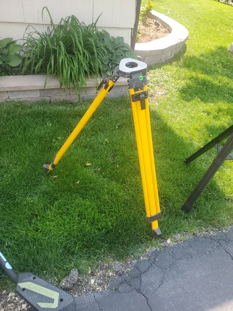Yellow surveyors Tripod