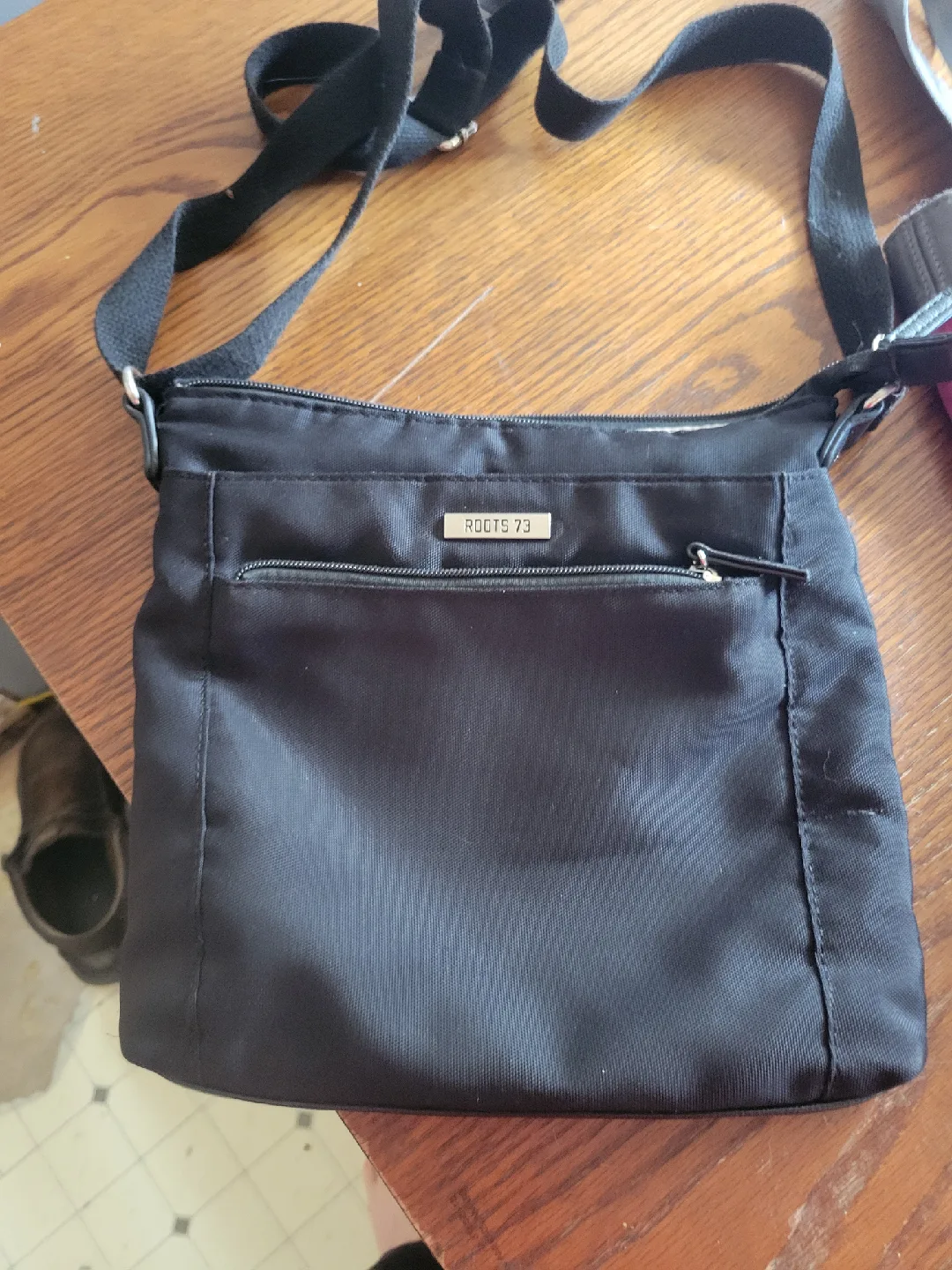 Roots 73 Black Crossbody Bag image indicator(3)