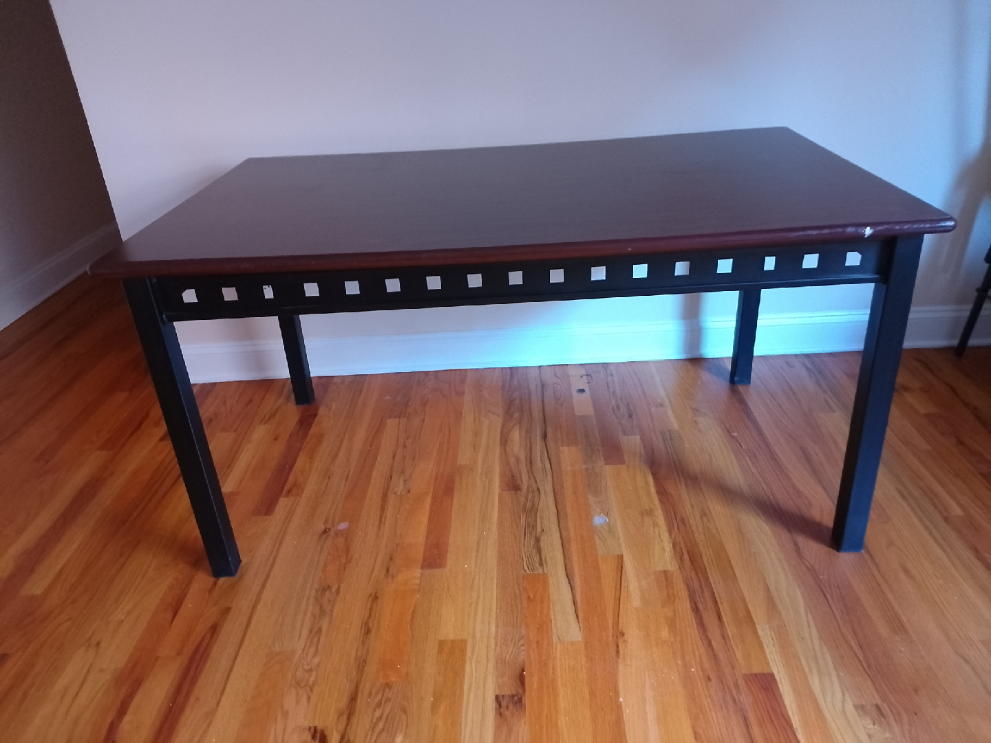 solid wood and metal dining table