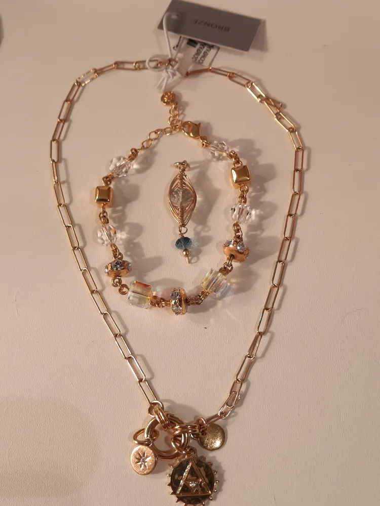 diadema neclase and other brand bracelet and one pendant thumbnail