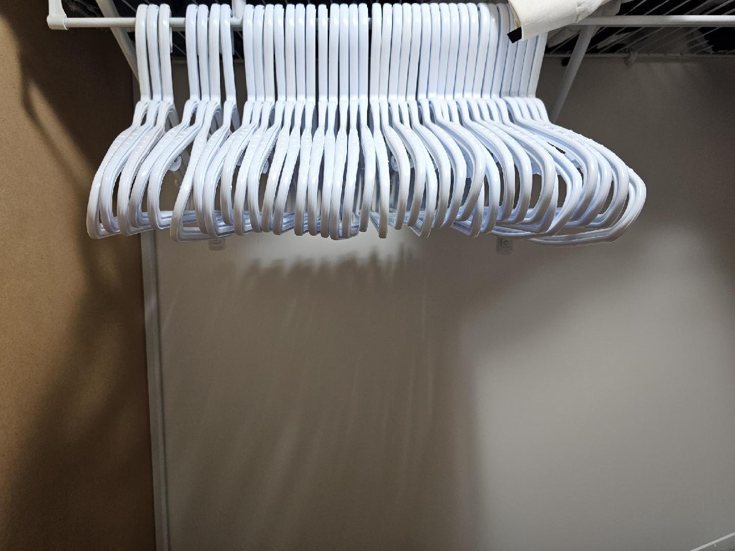White Plastic Clothes Hangers - Lot