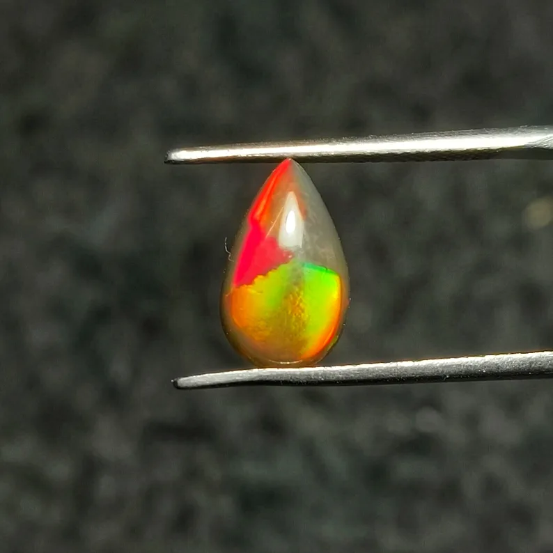 Beautiful 1.2 ct Pear-Shaped Cloverleaf/Broadflash Opal thumbnail