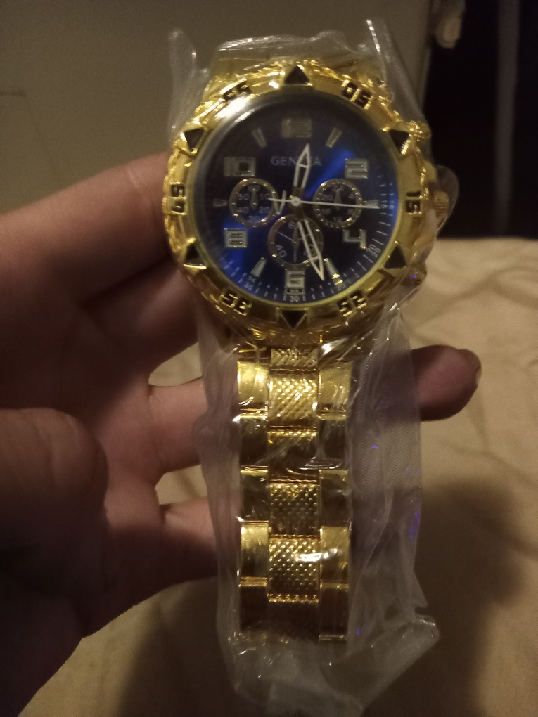Gold With Blue Dial Geneva Watch