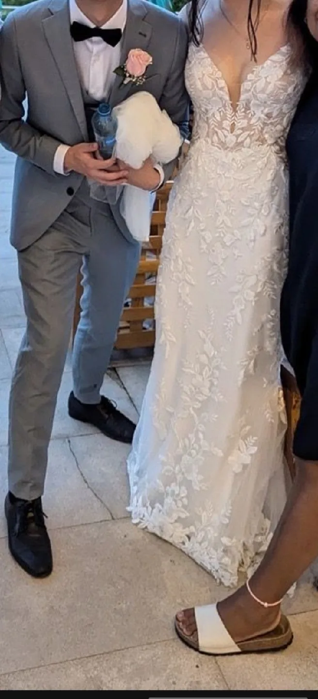 Lace wedding dress with detailed train image indicator(2)