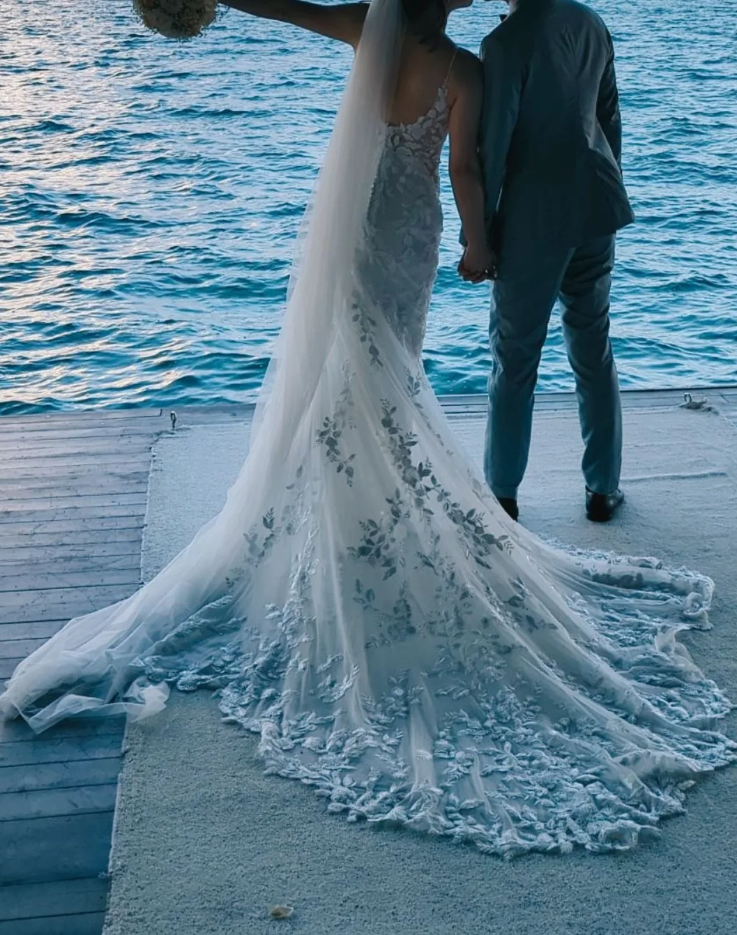 Lace wedding dress with detailed train image indicator(4)