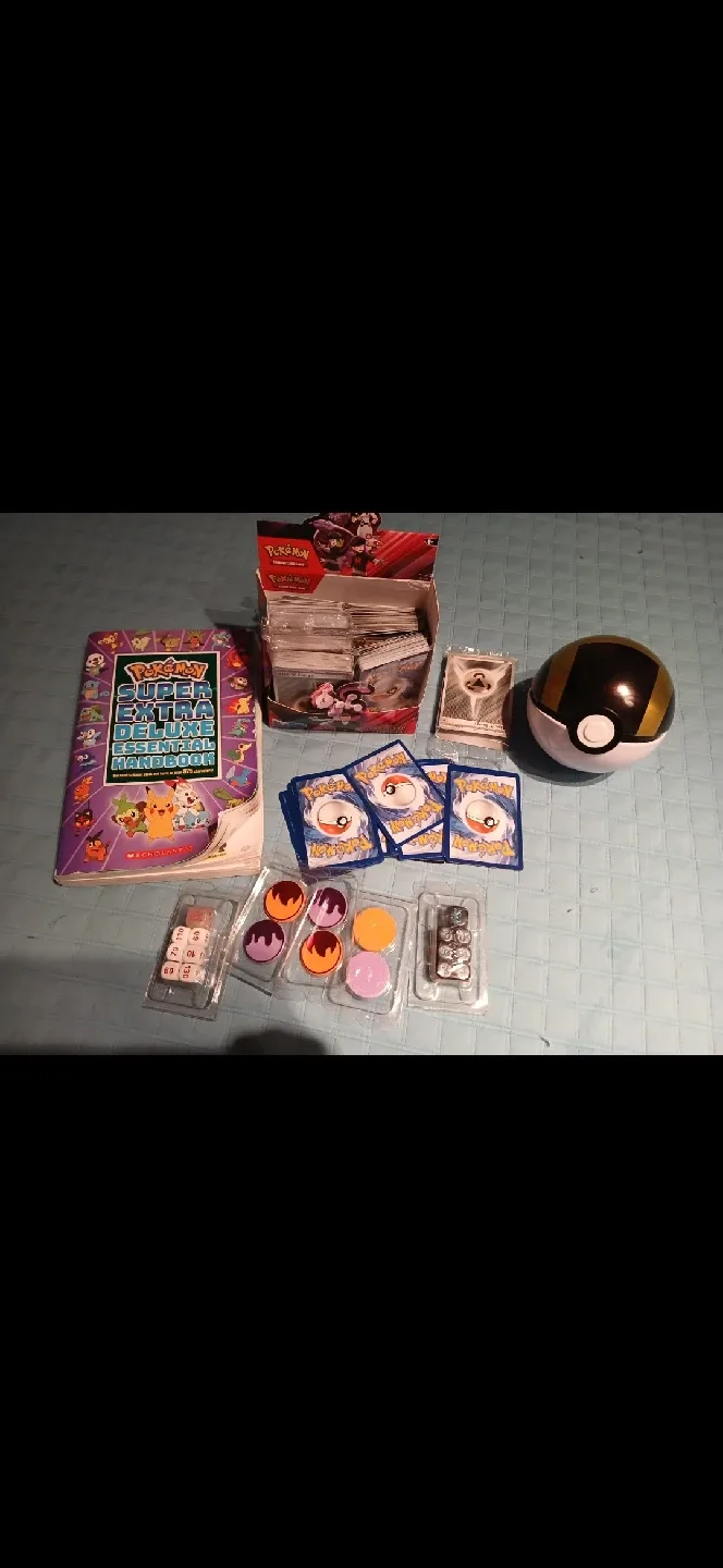 Pokemon TCG Bundle: Handbook, Cards, and More! image indicator(3)