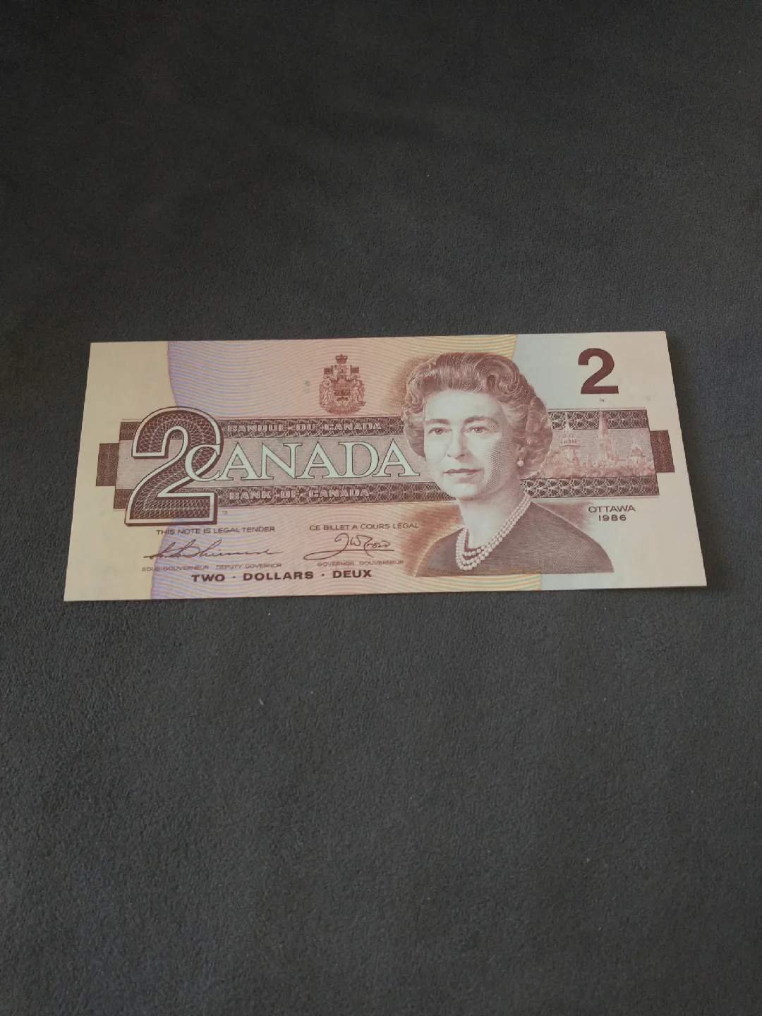 Crisp 1986 Canada GGT/JWC uncirculated $2 banknote serial 9164 thumbnail