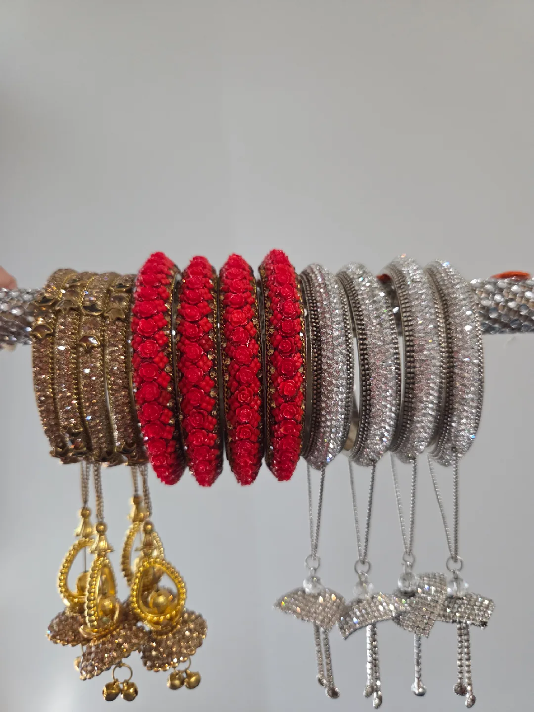 Set of 3 Bangles: Gold, Red, Silver image indicator(2)
