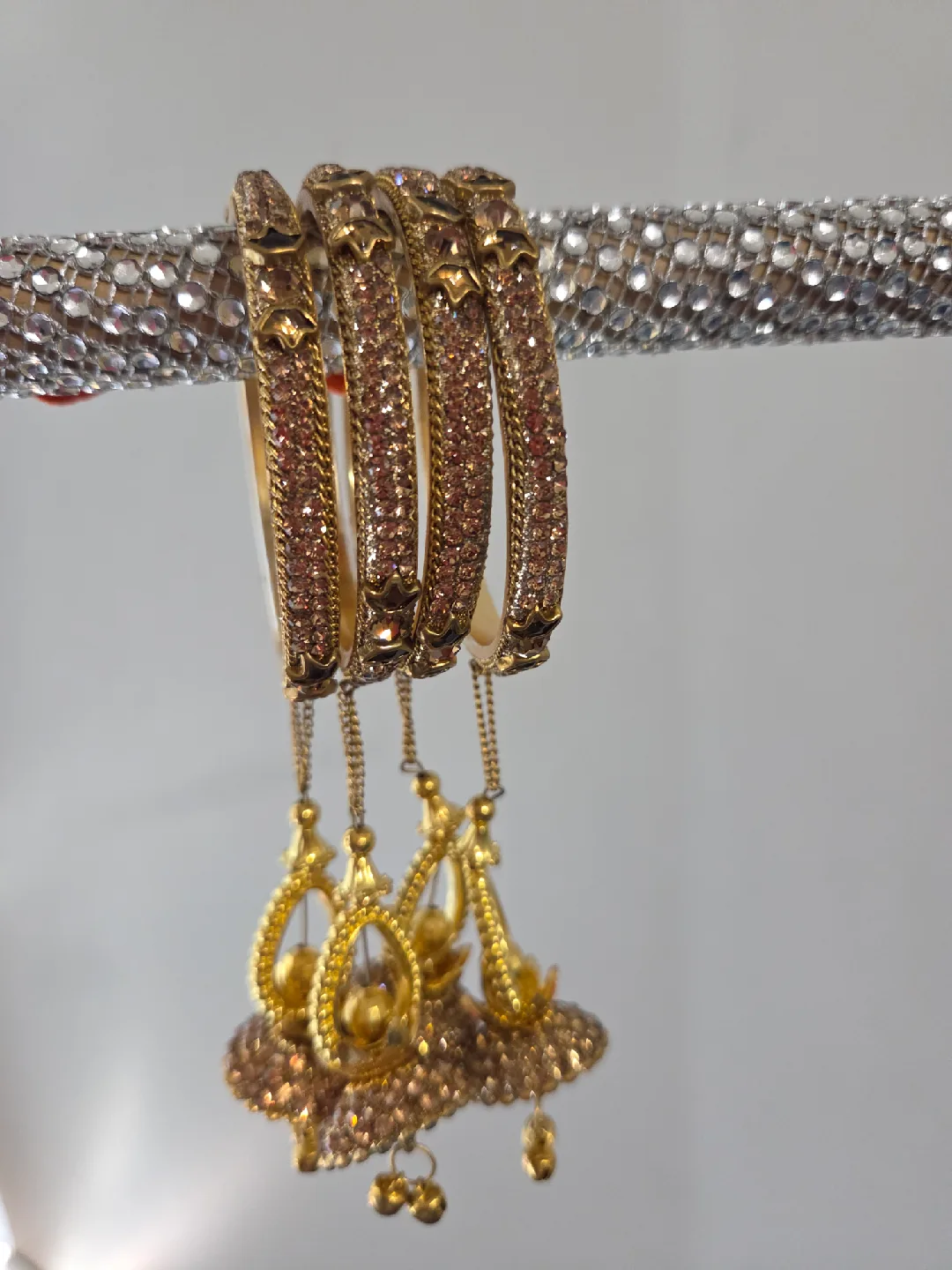 Set of 3 Bangles: Gold, Red, Silver image indicator(3)