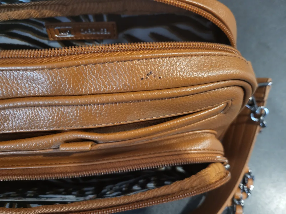 Lug Carrousel Crossbody Bag with Chain Strap image indicator(6)