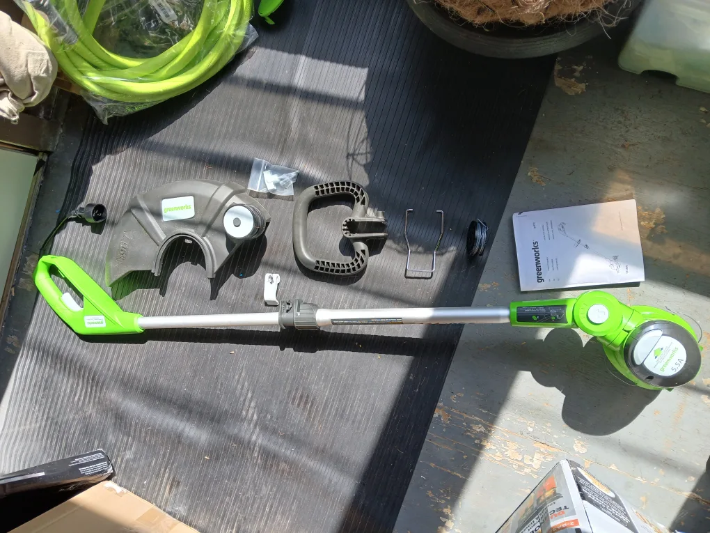 AS IS READ DESCRIPTION Greenworks 5.5A Corded String Trimmer image indicator(2)