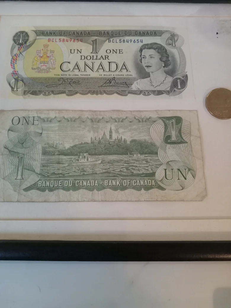 Framed Canadian One Dollar Bills & Coin image indicator(8)