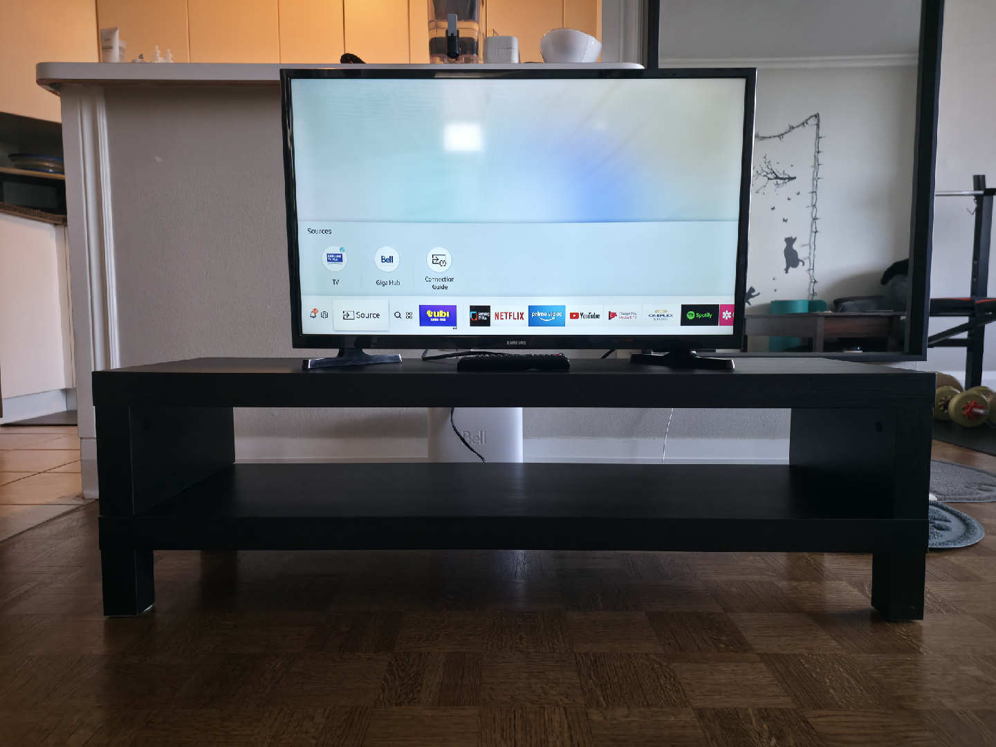 32" Samsung TV on Black TV Stand