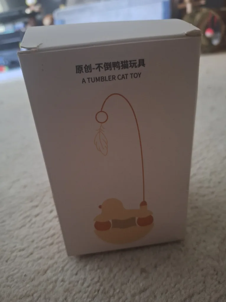 NEW Yellow Tumbler Cat Toy with Feather 😻 image indicator(2)