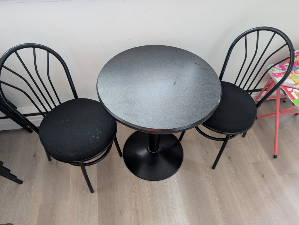 Black Round Table with Two Chairs