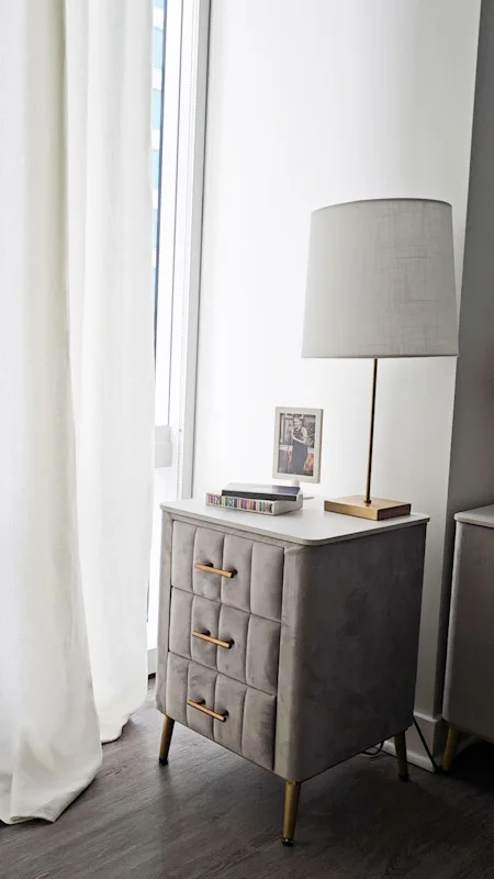 Gray Upholstered Side Tables with Gold Handles image indicator(8)