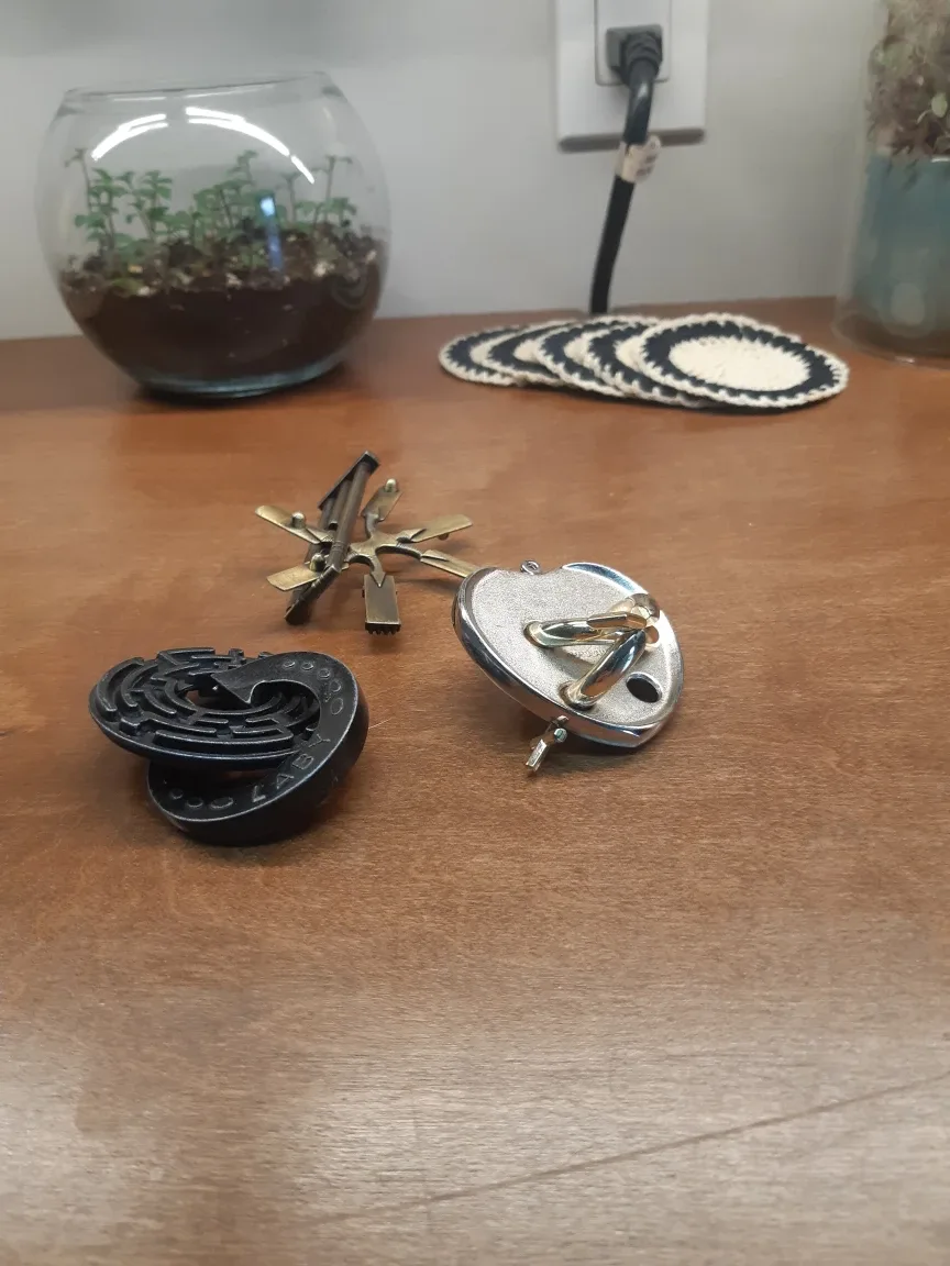 Set of 3 Metal Brain Teaser Puzzles / games thumbnail