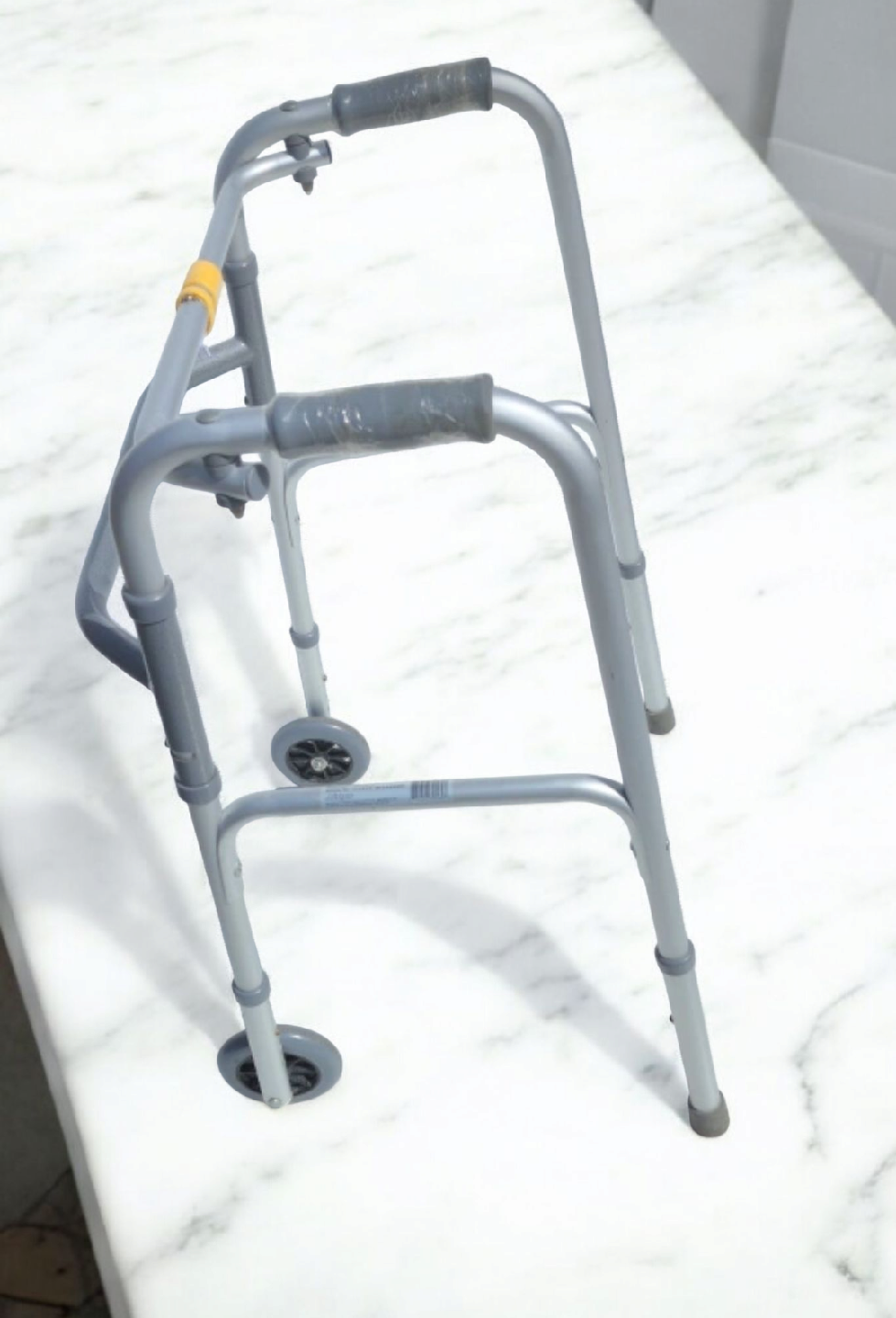 Deluxe Two Button Folding Walker with 5" Wheels