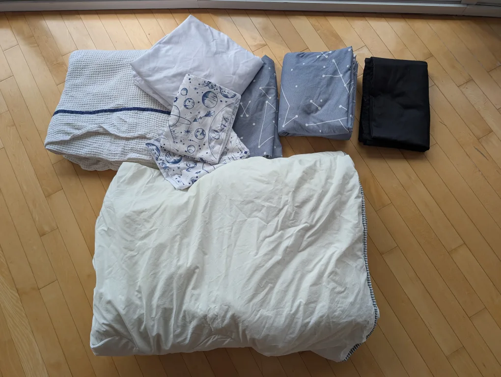 Bedding lot - twin comforter, 2 duvets, pillowcases etc. thumbnail