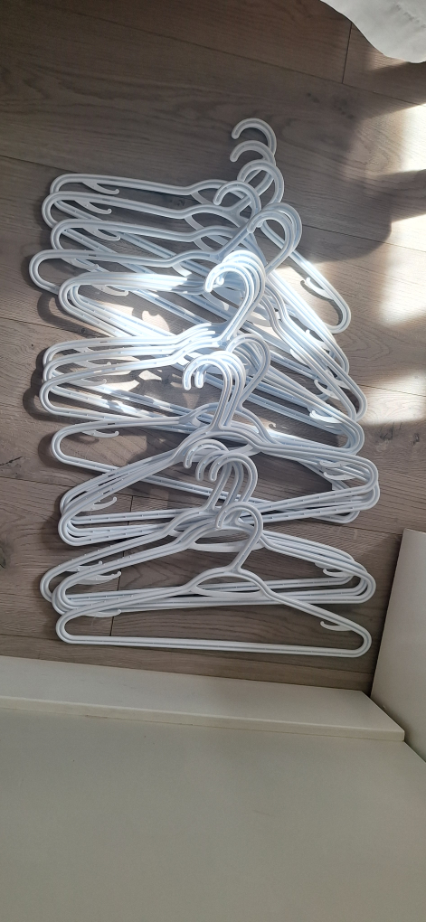 White and Mix Plastic Clothes Hangers - 145 pieces