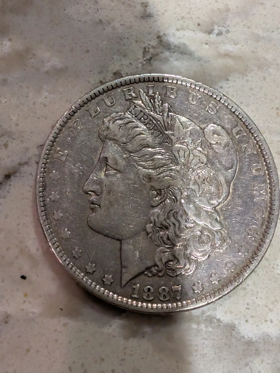 1887 Philadelphia Morgan Silver Dollar thumbnail