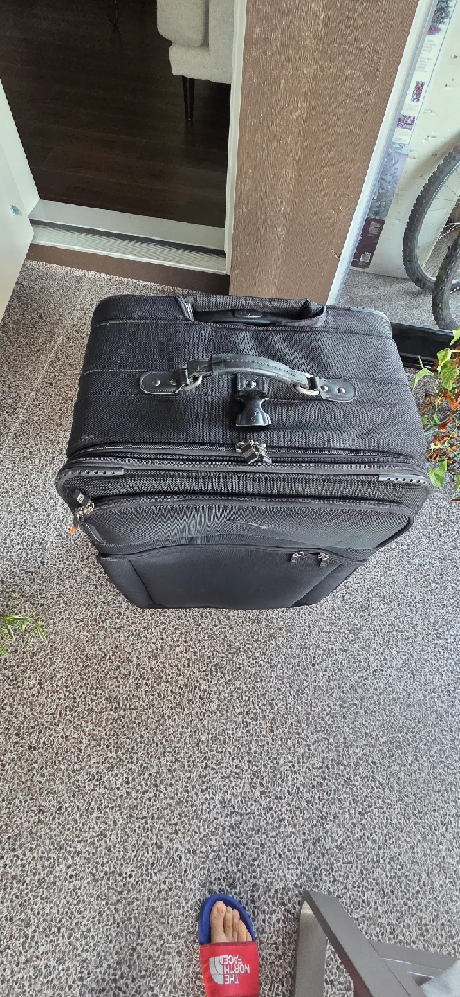 Tumi Black Rolling Suitcase image indicator(2)