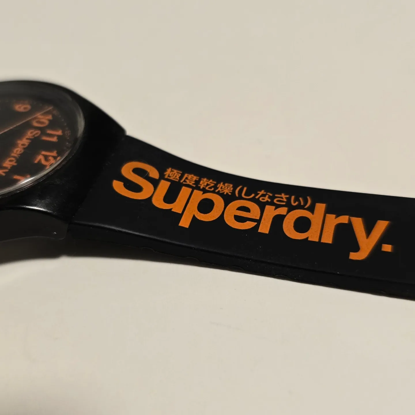 Superdry Black And Orange Watch New battery image indicator(5)