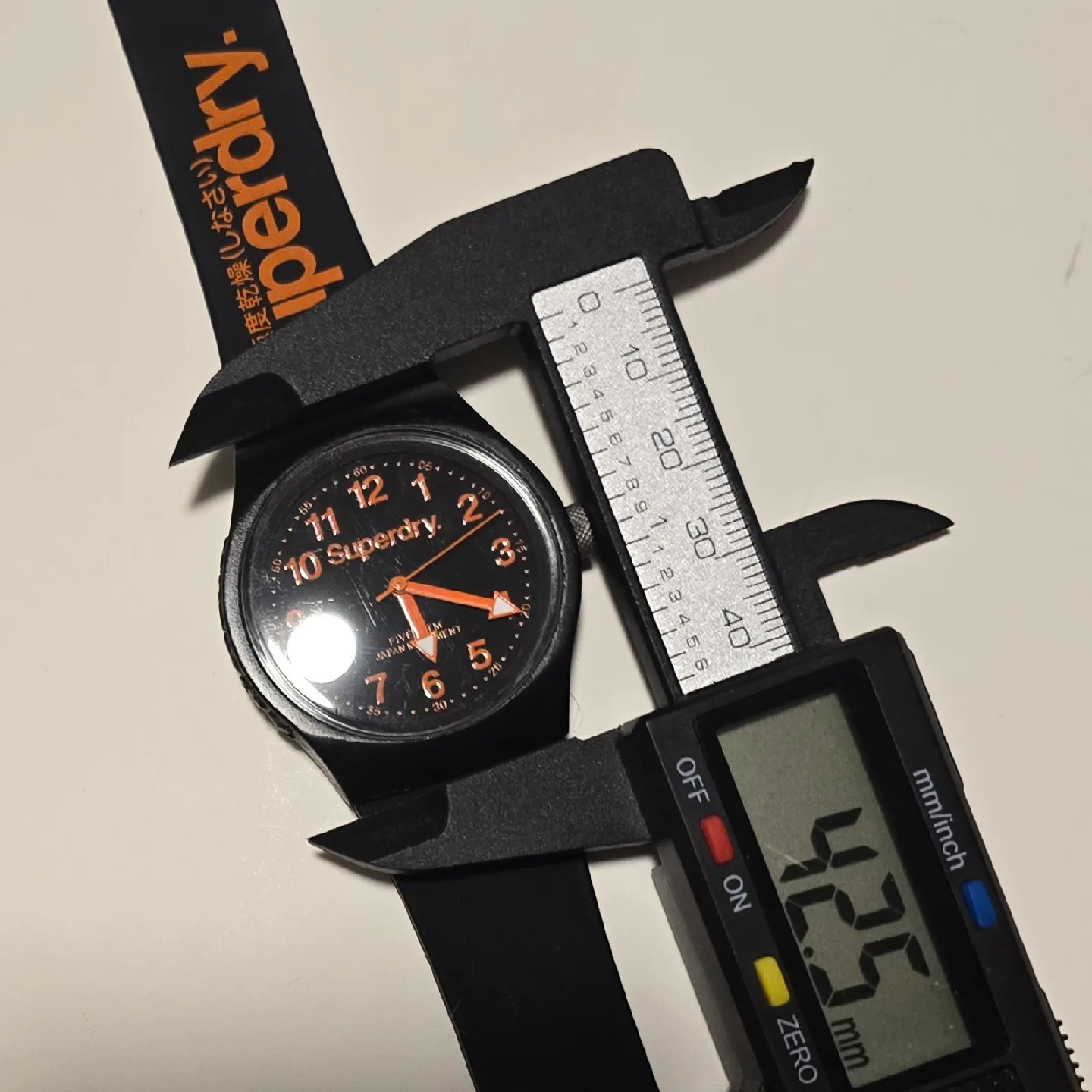 Superdry Black And Orange Watch New battery image indicator(9)