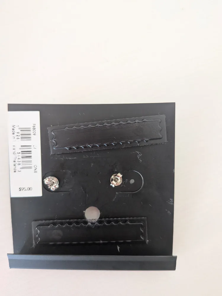 COACH stud earrings ($100 value) image indicator(2)