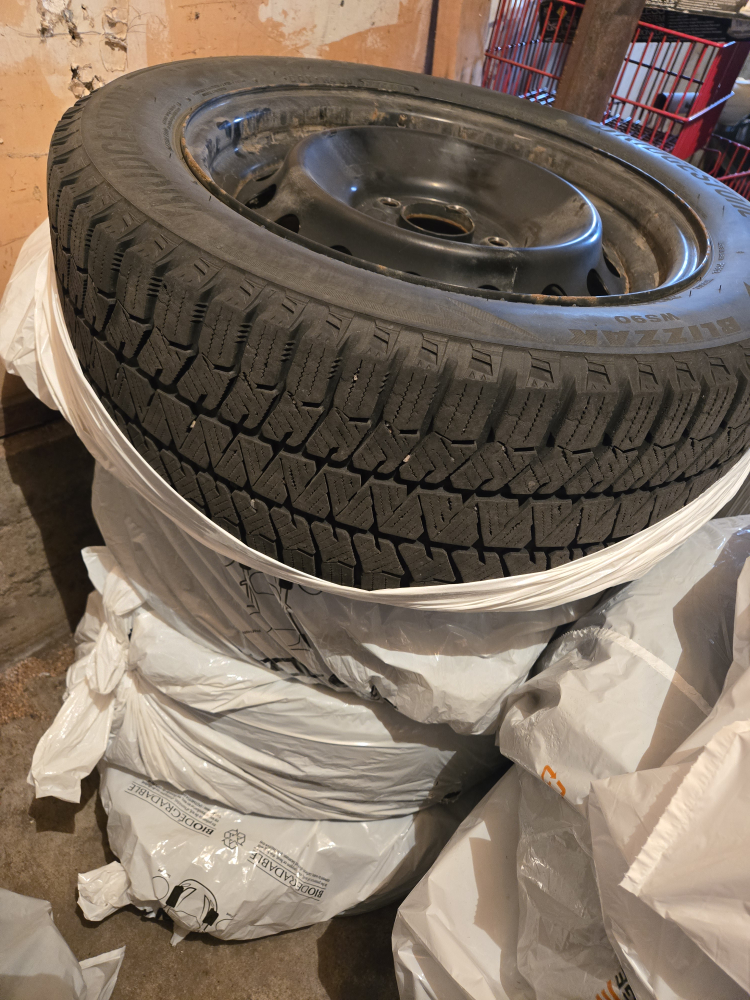 Good M+S Bridgestone tires with rims 215/55R16