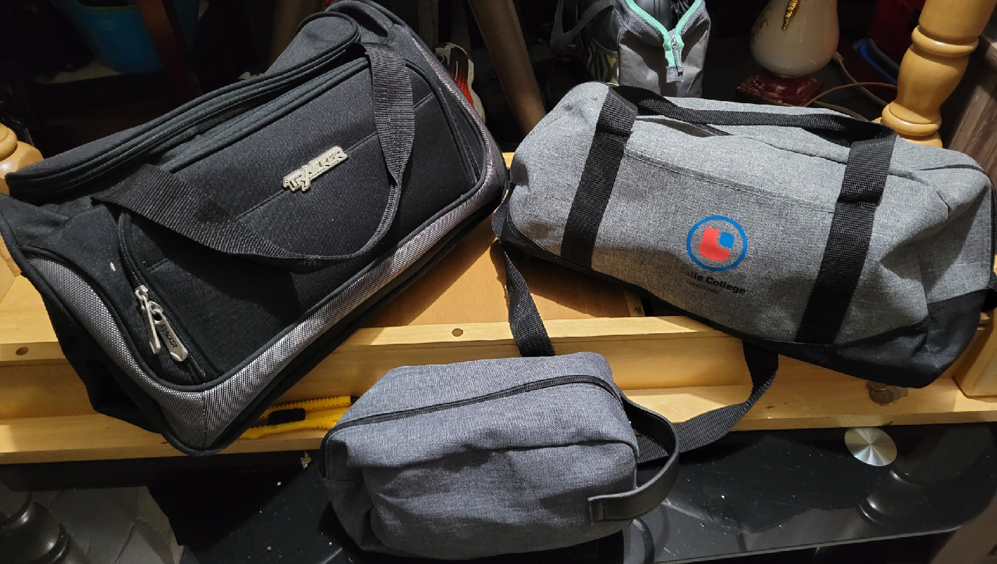Tracker Black Duffle Bag & Grey Toiletry Bag
