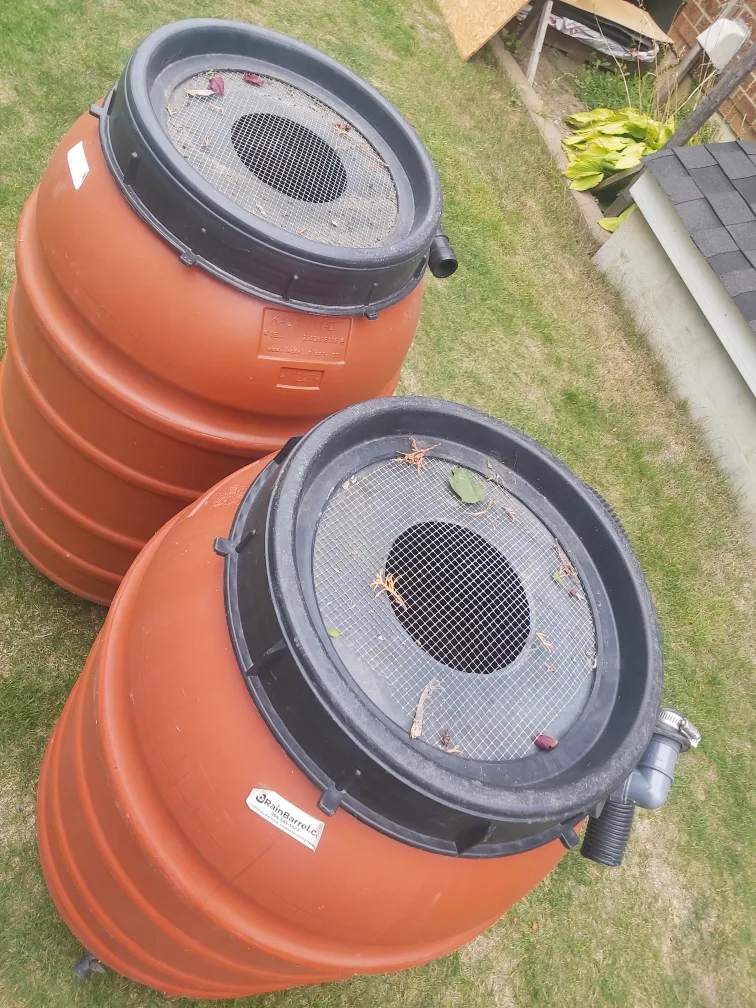 Two Orange Plastic Rain Barrels image indicator(7)
