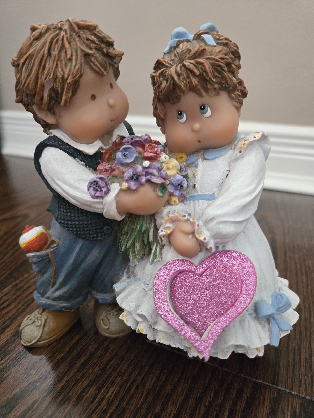 Ceramic Figurine of a Boy and Girl with Flowers and a Heart