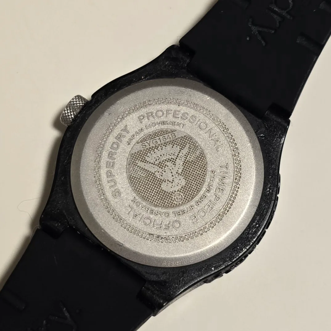 Superdry Black And Orange Watch New battery image indicator(7)