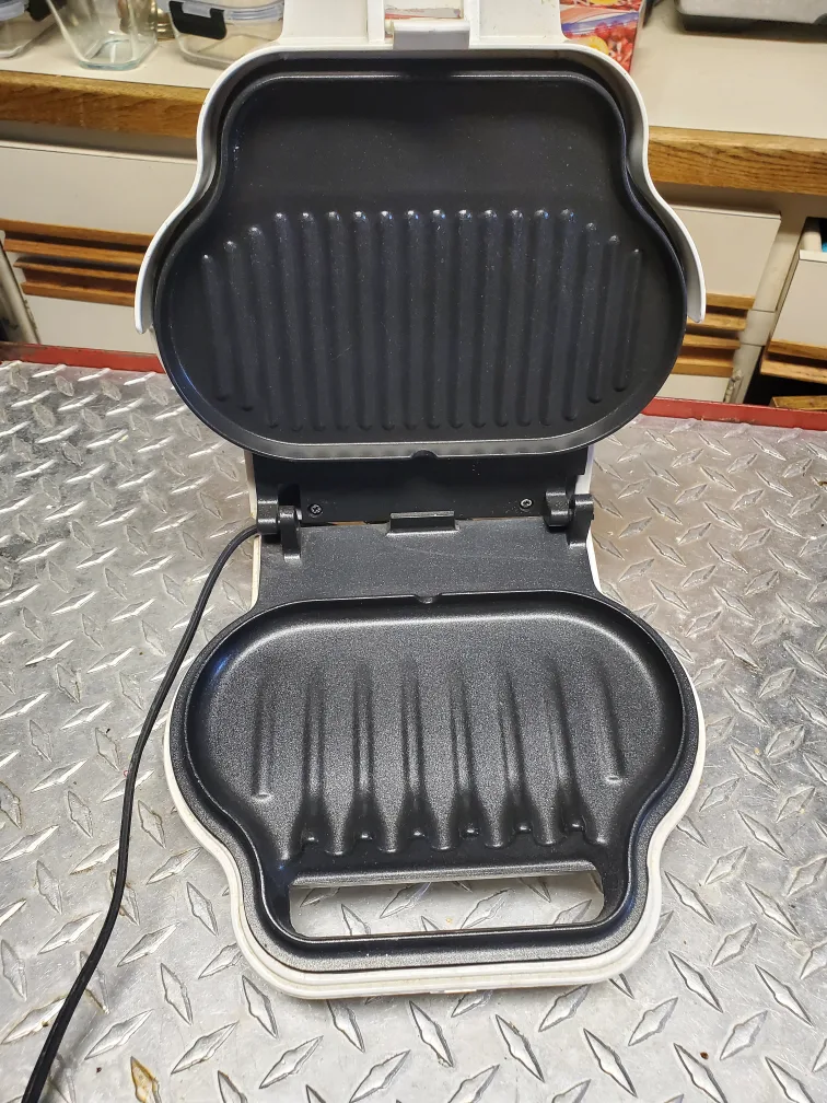 Small George Foreman Lean Mean Fat Grilling Machine image indicator(2)