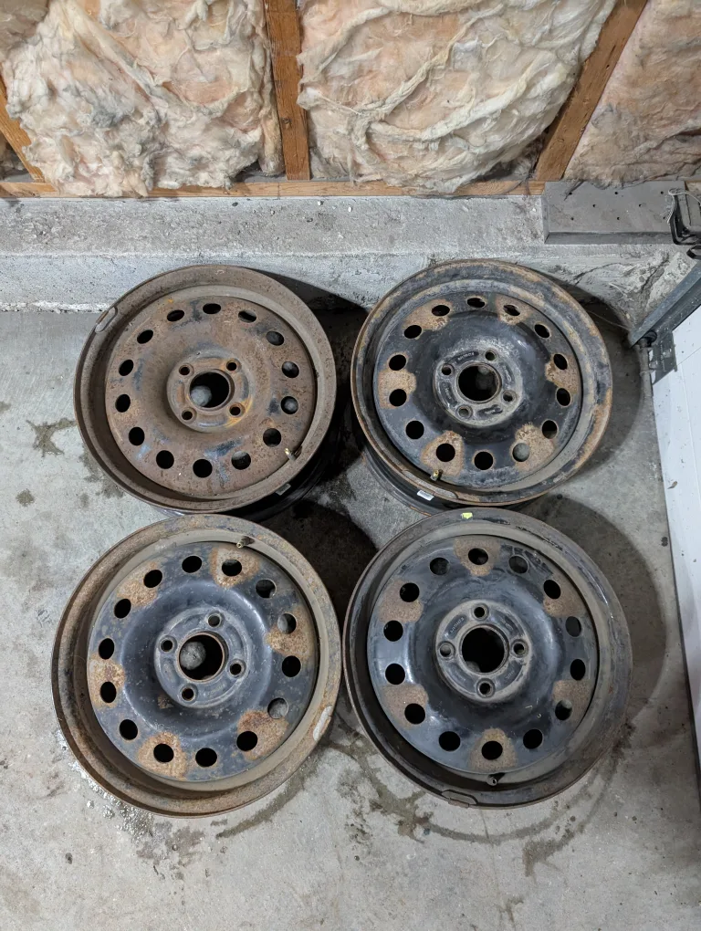 (4)-15 Inch Steel Rims 4x108 Off Older Ford Focus/TPMS Sensors thumbnail