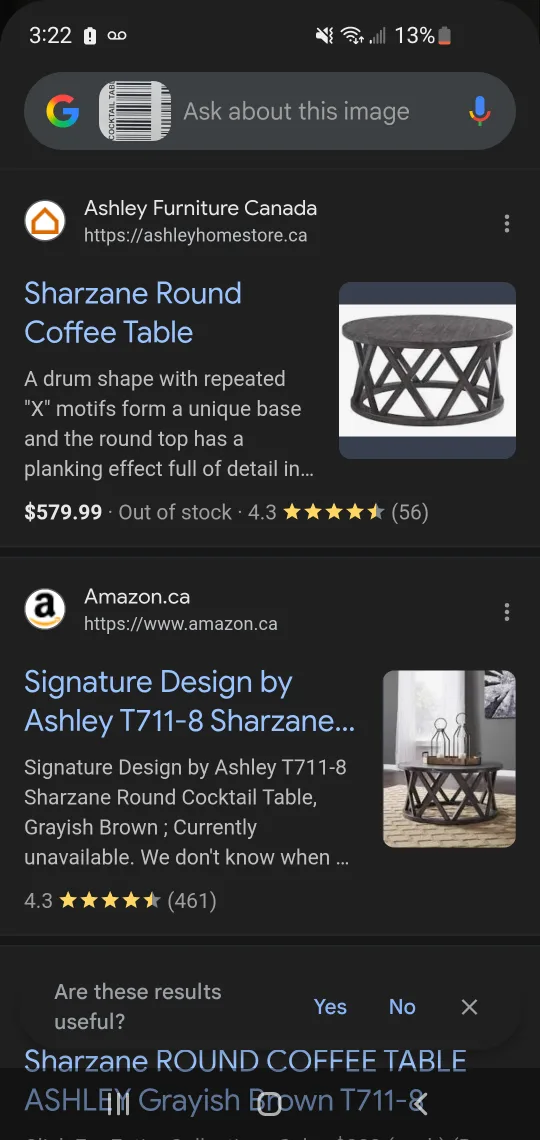 Ashley Sharzane Round Coffee Table image indicator(2)